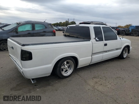 2000 GMC Sonoma SLS z VIN 1GTCS19W8Y8176036, wystawiony jako Copart lot #78777564 z przebiegiem 159 084 mil mil oraz Szkody całkowita. Historia ofert i sprzedaży dostępna na DreamBid. Obrazek 3.