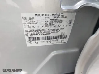 2011 Ford Edge SEL with VIN 2FMDK4JC8BBA90734, listed as a IAAI auction lot 41812079 with 121,947 mi miles. Bid and sale history available at carsss.com. Image 9.