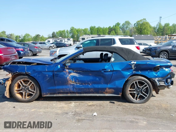 2022 Ford Mustang EcoBoost z VIN 1FATP8UH4N5102828, wystawiony jako IAAI lot #42073571 z przebiegiem 69 931 mil mil oraz . Historia ofert i sprzedaży dostępna na DreamBid. Obrazek 14.