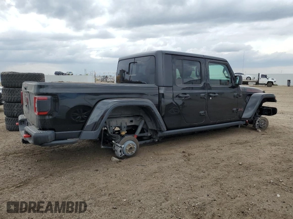 2023 Jeep Gladiator Rubicon with VIN 1C6JJTBG7PL573197, listed as a Copart auction lot 53866075 with 19,521 mi miles and Salvage title. Bid and sale history available at DreamBid. Image 3.