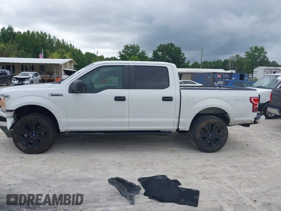 2020 Ford F-150 XL z VIN 1FTEW1EP3LFA05453, wystawiony jako IAAI lot #42644402 z przebiegiem 163 933 mil mil oraz . Historia ofert i sprzedaży dostępna na DreamBid. Obrazek 14.