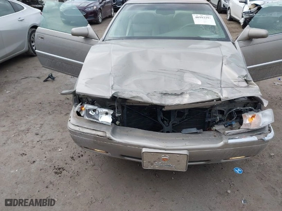 2000 Cadillac Eldorado with VIN 1G6EL12Y9YU184545, listed as a IAAI auction lot 40993392 with 51,983 mi miles. Bid and sale history available at carsss.com. Image 6.