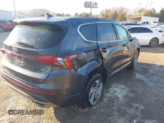 2021 Hyundai Santa Fe SE with VIN 5NMS1DAJXMH352741, listed as a IAAI auction lot 41273105 with 58,033 mi miles. Bid and sale history available at carsss.com. Image 4.
