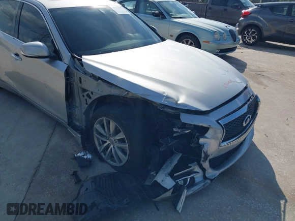 2014 Infiniti Q50 with VIN JN1BV7AP4EM677506, listed as a IAAI auction lot 40113207 with 142,446 mi miles and . Bid and sale history available at DreamBid. Image 6.
