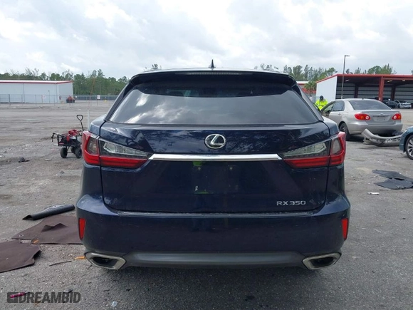2016 Lexus RX 350 with VIN 2T2ZZMCA0GC014534, listed as a IAAI auction lot 41725029 with 149,891 mi miles. Bid and sale history available at carsss.com. Image 16.