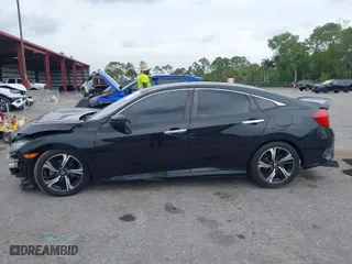 2016 Honda Civic Sedan Touring with VIN 19XFC1F92GE007692, listed as a IAAI auction lot 41863790 with 139,537 mi miles. Bid and sale history available at carsss.com. Image 14.