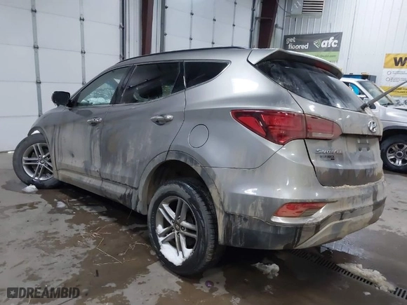 2018 Hyundai Santa Fe Sport 2.4L with VIN 5NMZUDLBXJH075211, listed as a IAAI auction lot 41497651 with 57,420 mi miles. Bid and sale history available at carsss.com. Image 3.