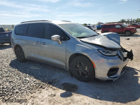 2021 Chrysler Pacifica Hybrid Touring L with VIN 2C4RC1L74MR529704, listed as a Copart auction lot 49604955 with 52,451 mi miles and Non Repairable. Bid and sale history available at carsss.com. Image 4.