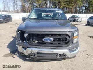 2023 Ford F-150 XL with VIN 1FTEW1CB1PKG04498, listed as a Copart auction lot 43714565 with 21,842 mi miles and Salvage Title. Bid and sale history available at carsss.com. Image 5.