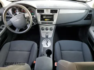 2010 Chrysler Sebring Touring z VIN 1C3CC4FBXAN119459, wystawiony jako Copart lot #47165515 z przebiegiem 125 382 mil mil oraz Szkoda całkowita • Salvage title. Historia ofert i sprzedaży dostępna na DreamBid. Obrazek 8.