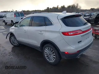 2019 Lincoln MKC Standard with VIN 5LMCJ1D91KUL26077, listed as a IAAI auction lot 41455499 with 55,782 mi miles. Bid and sale history available at carsss.com. Image 3.