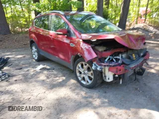 2014 Ford Escape Titanium with VIN 1FMCU9JX7EUB68165, listed as a IAAI auction lot 42141235 with 172,041 mi miles and . Bid and sale history available at DreamBid. Image 1.