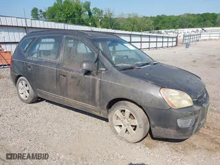 2007 Kia Rondo LX with VIN KNAFG525877075202, listed as a IAAI auction lot 42014611 with 206,496 mi miles. Bid and sale history available at carsss.com. Image 1.