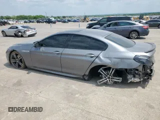 2018 BMW 6 Series 650i z VIN WBA6D4C59JD981398, wystawiony jako Copart lot #53455655 z przebiegiem 19 752 mil mil oraz Szkody całkowita. Historia ofert i sprzedaży dostępna na DreamBid. Obrazek 2.