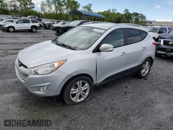2013 Hyundai Tucson GLS with VIN KM8JU3AC1DU709937, listed as a Copart auction lot 52716295 with 181,711 mi miles and Salvage Title. Bid and sale history available at carsss.com. Image 1.