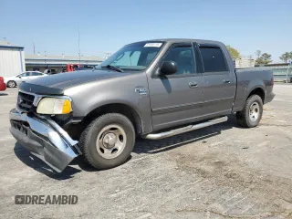 2003 Ford F-150 XLT with VIN 1FTRW07663KA63497, listed as a Copart auction lot 51658115 with 269,633 mi miles and Salvage Title. Bid and sale history available at carsss.com. Image 1.