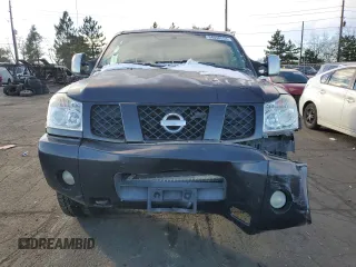 2004 Nissan Titan LE z VIN 1N6AA07B54N521567, wystawiony jako Copart lot #84048554 z przebiegiem 194 997 mil mil oraz Nie do naprawy • Non repairable. Historia ofert i sprzedaży dostępna na DreamBid. Obrazek 5.