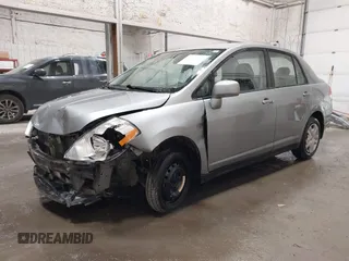 2011 Nissan Versa S with VIN 3N1BC1AP9BL485989, listed as a IAAI auction lot 42414692 with 122,213 mi miles and . Bid and sale history available at DreamBid. Image 2.