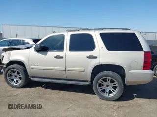 2007 Chevrolet Tahoe LS z VIN 1GNFC13C97J402723, wystawiony jako IAAI lot #42588033 z przebiegiem Nie podano mil oraz . Historia ofert i sprzedaży dostępna na DreamBid. Obrazek 15.