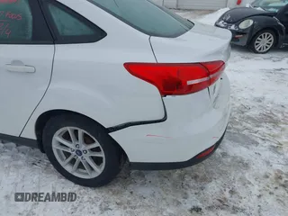 2017 Ford Focus SE with VIN 1FADP3F20HL235067, listed as a IAAI auction lot 41580300 with 79,009 mi miles and . Bid and sale history available at DreamBid. Image 13.
