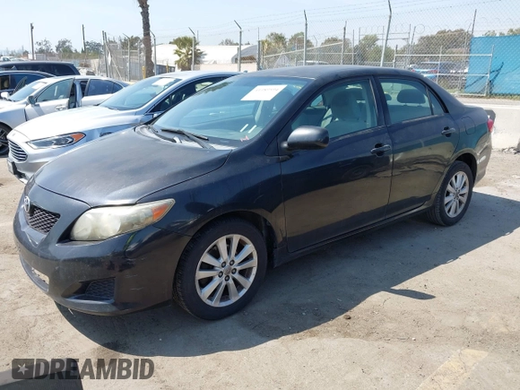 2009 Toyota Corolla with VIN 1NXBU40E89Z056754, listed as a IAAI auction lot 41989594 with 187,890 mi miles. Bid and sale history available at carsss.com. Image 2.