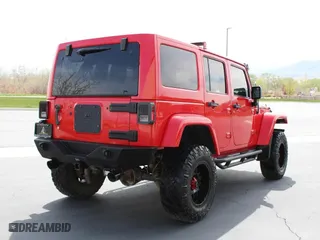 2015 Jeep Wrangler Unlimited Rubicon with VIN 1C4BJWFG7FL646463, listed as a Copart auction lot 53700245 with 97,412 mi miles and Salvage Title. Bid and sale history available at carsss.com. Image 3.