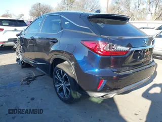 2018 Lexus RX with VIN 2T2ZZMCA2JC110964, listed as a IAAI auction lot 41142683 with 68,667 mi miles. Bid and sale history available at carsss.com. Image 3.