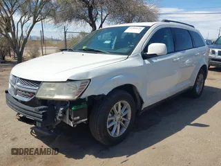 2015 Dodge Journey SXT with VIN 3C4PDCBG5FT644488, listed as a IAAI auction lot 41884638 with 102,677 mi miles and . Bid and sale history available at DreamBid. Image 2.