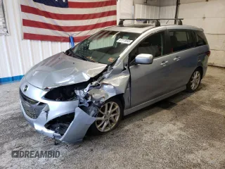 2012 Mazda 5 Touring with VIN JM1CW2CL6C0107720, listed as a Copart auction lot 57313045 with 112,051 mi miles and Salvage title. Bid and sale history available at DreamBid. Image 1.