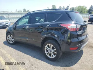 2018 Ford Escape SE z VIN 1FMCU9GD3JUA78244, wystawiony jako Copart lot #59508955 z przebiegiem 108 273 mil mil oraz Szkoda całkowita • Salvage title. Historia ofert i sprzedaży dostępna na DreamBid. Obrazek 2.