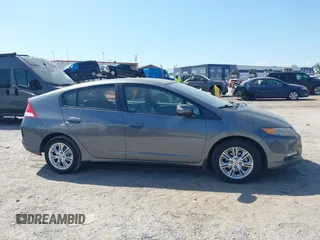 2010 Honda Insight EX z VIN JHMZE2H72AS036072, wystawiony jako IAAI lot #42139823 z przebiegiem 257 511 mil mil oraz . Historia ofert i sprzedaży dostępna na DreamBid. Obrazek 13.