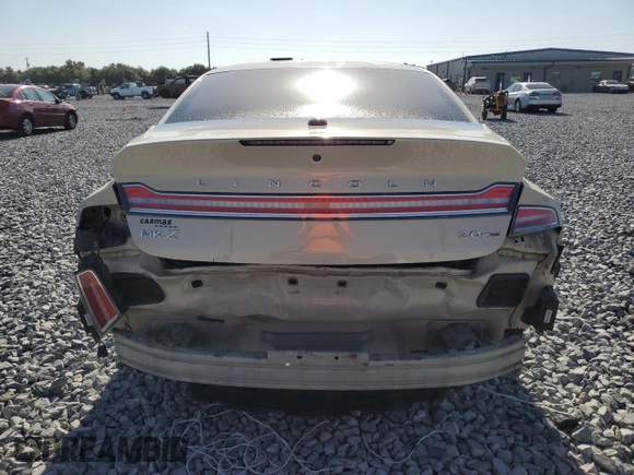 2016 Lincoln MKZ z VIN 3LN6L2G93GR615052, wystawiony jako Copart lot #54717335 z przebiegiem 86 575 mil mil oraz Szkoda całkowita • Salvage title. Historia ofert i sprzedaży dostępna na DreamBid. Obrazek 6.