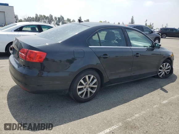 2013 Volkswagen Jetta SE with VIN 3VWDX7AJ6DM438180, listed as a Copart auction lot 59582655 with 106,082 mi miles and Salvage title. Bid and sale history available at DreamBid. Image 3.