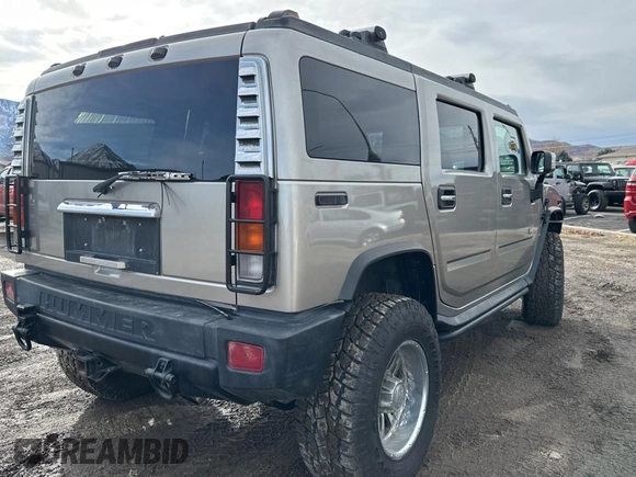2003 Hummer H2 with VIN 5GRGN23UX3H124517, listed as a Copart auction lot 41650395 with 999,999 mi miles and Clean Title. Bid and sale history available at carsss.com. Image 4.