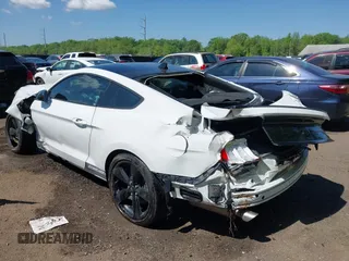 2021 Ford Mustang EcoBoost with VIN 1FA6P8TH6M5148562, listed as a IAAI auction lot 42147236 with 57,050 mi miles and . Bid and sale history available at DreamBid. Image 3.