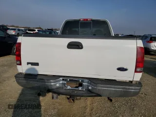 1999 Ford F-150 XL with VIN 1FTRX17L2XKC10123, listed as a Copart auction lot 83158894 with 57,446 mi miles and Salvage Title. Bid and sale history available at carsss.com. Image 6.