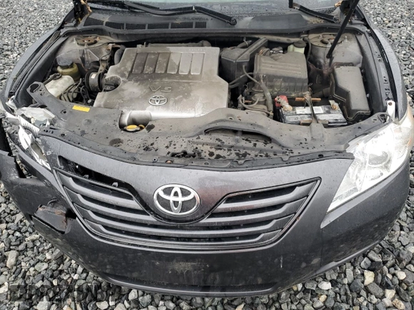 2009 Toyota Camry LE z VIN 4T1BK46K69U091909, wystawiony jako Copart lot #56214505 z przebiegiem 157 133 mil mil oraz Czysty tytuł • Clean title. Historia ofert i sprzedaży dostępna na DreamBid. Obrazek 11.