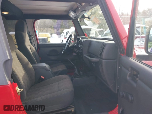 2005 Jeep Wrangler Rubicon with VIN 1J4FA69S25P316085, listed as a IAAI auction lot 41503034 with 57,252 mi miles. Bid and sale history available at carsss.com. Image 5.