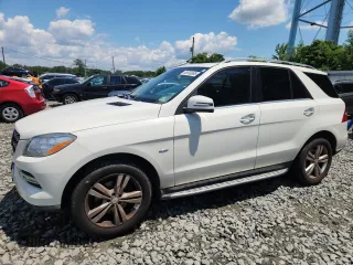 2012 Mercedes-Benz M 350 with VIN 4JGDA5HB0CA070206, listed as a Copart auction lot 65900065 with 210,711 mi miles and Clean title. Bid and sale history available at DreamBid. Image 1.