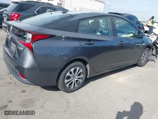 2019 Toyota Prius LE with VIN JTDL9RFUXK3005094, listed as a IAAI auction lot 41948749 with 98,156 mi miles. Bid and sale history available at carsss.com. Image 4.