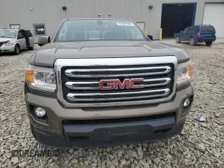 2016 GMC Canyon 4WD SLE z VIN 1GTG6CE38G1303839, wystawiony jako Copart lot #57387295 z przebiegiem 87 945 mil mil oraz Nie do naprawy. Historia ofert i sprzedaży dostępna na DreamBid. Obrazek 5.