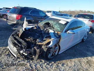 2014 Audi S7 Prestige with VIN WAUW2BFC2EN056014, listed as a IAAI auction lot 41148744 with 1 mi miles. Bid and sale history available at carsss.com. Image 2.