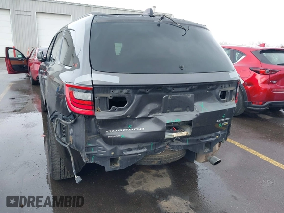2015 Dodge Durango Limited with VIN 1C4RDJDG1FC873918, listed as a IAAI auction lot 41593090 with 137,871 mi miles and . Bid and sale history available at DreamBid. Image 6.