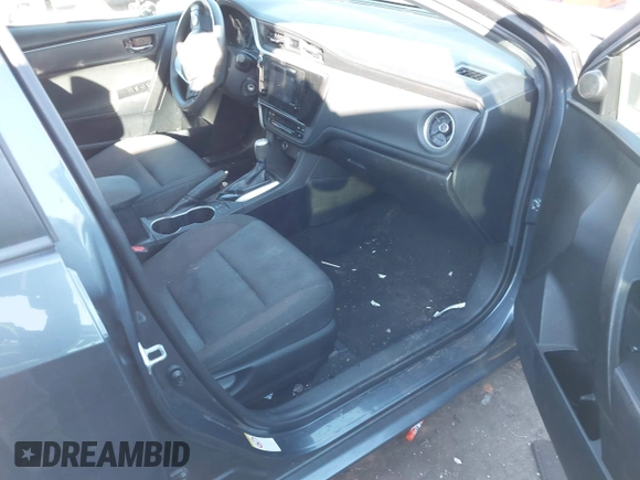 2019 Toyota Corolla L with VIN 2T1BURHE4KC209414, listed as a IAAI auction lot 41669591 with 98,072 mi miles and . Bid and sale history available at carsss.com. Image 5.