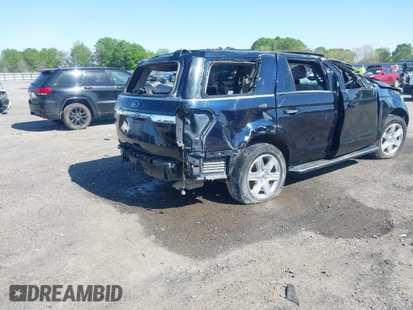 2021 Ford Expedition XLT with VIN 1FMJU1HT1MEA60855, listed as a IAAI auction lot 41962157 with 100,178 mi miles and . Bid and sale history available at DreamBid. Image 4.