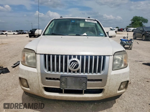 2010 Mercury Mariner Premier с VIN 4M2CN8HG7AKJ29917, выставлен на аукционе Copart как лот 63306425 с пробегом 288 075 миль миль и Списание • Salvage title. История ставок и продаж доступна на DreamBid. Изображение 5.