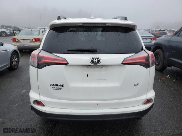 2018 Toyota RAV4 LE with VIN JTMZFREV1JJ189574, listed as a Copart auction lot 48169025 with 89,488 mi miles and Salvage Title. Bid and sale history available at carsss.com. Image 6.
