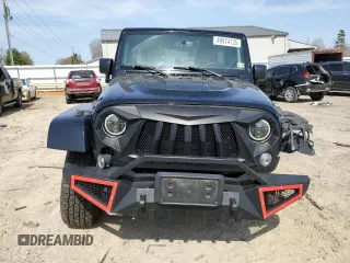 2016 Jeep Wrangler Unlimited Rubicon with VIN 1C4HJWFG4GL107777, listed as a Copart auction lot 48974135 with 118,164 mi miles and Salvage Title. Bid and sale history available at carsss.com. Image 5.