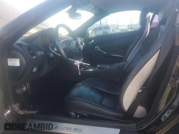 2006 Mercedes-Benz SLK-Class 5.5L AMG with VIN WDBWK73F16F093516, listed as a Copart auction lot 77485754 with 112,419 mi miles and Salvage Title. Bid and sale history available at carsss.com. Image 7.
