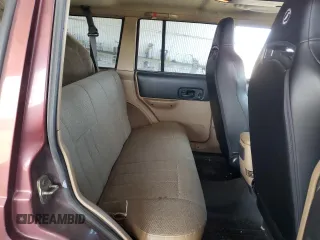 2000 Jeep Cherokee Classic with VIN 1J4FF58S8YL135534, listed as a Copart auction lot 62211335 with 108,888 mi miles and Salvage title. Bid and sale history available at DreamBid. Image 10.